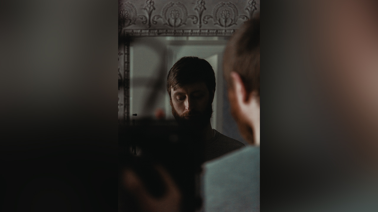 photograph of an actor on set